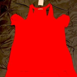 Red shirt with shoulder cutouts